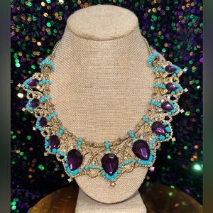 Mardi Gras style Gold toned purple and blue costume jewelry necklace. 19-21.5”